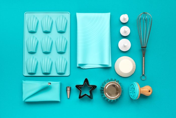 Baking utensils on blue pastel background. Top view. Flat lay. Copy space