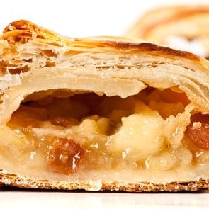 Studio close up of delicious apfelstrudel (apple pie) isolated on white background